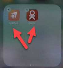 Hold the first app again and then drag it over to another app